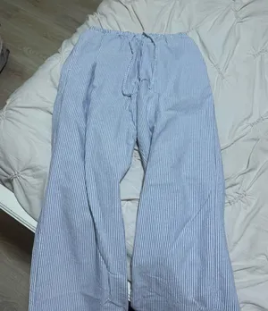 Brandy Melville blue and white striped pants thumbnail 1