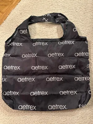 Black Aetrex tote bag/grocery bag. Folds into itself/portable. New without tags thumbnail 1