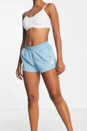 Nike Running Dri-FIT Swoosh mid-rise brief-lined shorts in pale blue size medium thumbnail 1