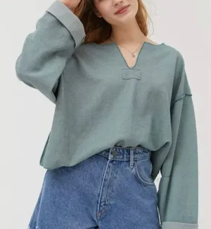 Urban Outfitters Jax turquoise inside out cropped notch neck sweater small thumbnail 1
