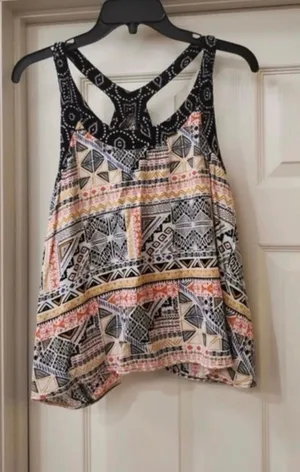Xhilaration ladies sleeveless blouse is a junior size XL. thumbnail 1