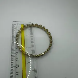 Gold tone and rhinestone bangle bracelet thumbnail 4