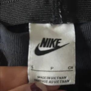 Nike Women's Classic Black Flare Pants thumbnail 4