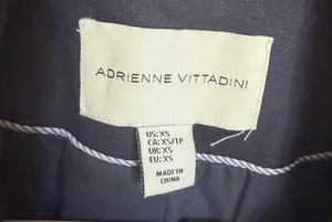 Adrienne Vittadini Modern Navy Linen-Blend Blazer - XS Elevate your wardrobe with this sophisticated Adrienne Vittadini blazer. Featuring a sleek, modern silhouette in a classic navy blue, this piece is the perfect blend of professional polish and effortless style.• Brand: Adrienne Vittadini (Modern Collection)• Size: Women's XS• Color: Deep Navy Blue• Condition: Like new, excellent pre-owned condition with no visible flaws.• Features: Elegant stand-up collar, single gold-tone button closure, and functional flap pockets. Finished with stylish button detailing on the cuffs.• Versatility: A true closet staple that transitions perfectly from a day at the office to a casual weekend look paired with jeans. The lightweight fabric and tailored fit offer a flattering, high-end feel. This blazer is ready to ship and elevate your next outfit!• Standard XS fit• Dry clean recommended to maintain the structured look. thumbnail 4