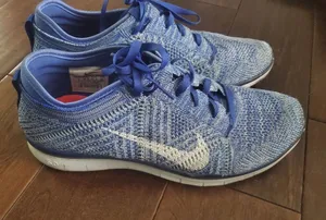 Nike Women’s Flyknit Running Sneakers - Blue/White Size 9 thumbnail 1