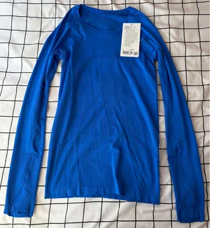 Lululemon Blue Long Sleeve Swiftly Tech, Size 4, Hip Length. NWT. thumbnail 1