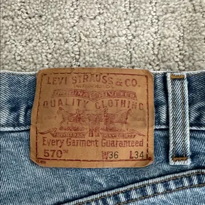 Vintage Levi’s 570 Y2K 90s high waist denim cutoff shorts thumbnail 7