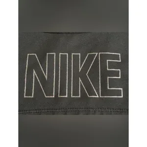Nike Dri-FIT Women's Swoosh Graphic Sports Bra - Black/Silver Glitter , Size XS thumbnail 2