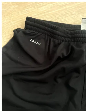 Nike Women’s Dri-FIT Black Zip-Ankle Track Pants M thumbnail 5