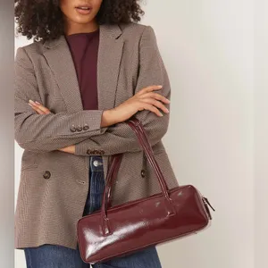 ASOS- burgundy patent faux leather elongated shoulder bag thumbnail 4