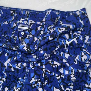 Nike Legend 2.0 Dri-FIT Printed Capri leggings featuring a blue quake pattern thumbnail 2