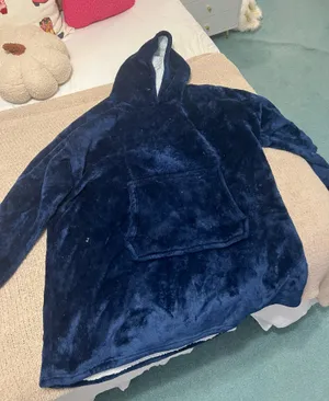 Cozy Casual Soft and plush blue fleece hoodie with a front pocket. Perfect for staying warm and comfortable. Just needs to be lint rolled or thrown in dryer. thumbnail 1