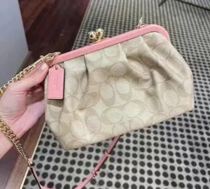 Nora Kisslock Crossbody In Signature Canvas (Coach C2876) thumbnail 1