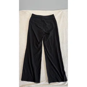 Athleta Black Wide Leg Side Zip Trousers Snap side Pants Size 4 thumbnail 2