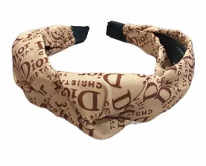 Source Unknown NWOT Fashion Headband Beige w/Brown “D” Prints thumbnail 1