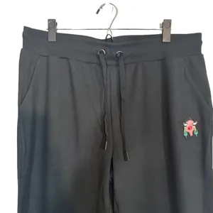 Badgley Mischka Women’s Black French Terry Joggers Face Logo Original Artwork LG thumbnail 3