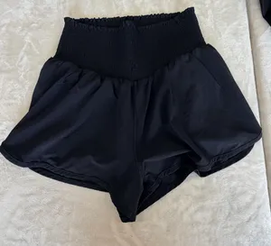 aerie Black Smocked-Waist Flow Shorts thumbnail 1