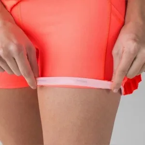 Lululemon Pleat To Street Skirt II- Grapefruit- Size 8 thumbnail 5