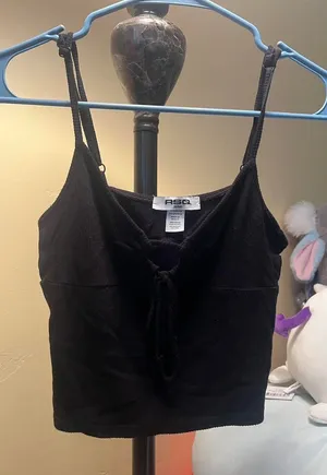 Black tie front crop top #croptop RSQ black crop top from Tillys Size M but fits like a Small Friendlier to girls with smaller chests! thumbnail 1