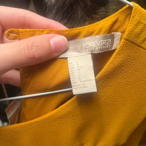 Forever 21 Yellow midi dress with lace in front #yellowdress #mididress Never worn and comes with extra button Size L but fits like a Medium thumbnail 3