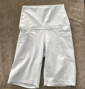 90degree by Reflex biker shorts with side pockets. Size XS. Color light gray. thumbnail 1