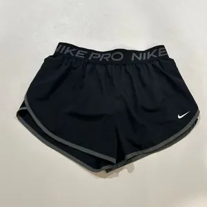 Nike Pro Dri-Fit Running Shorts Black Gray Trim Athletic Women’s Medium thumbnail 3