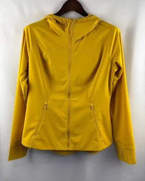 Women’s LuluLemon Size 12 Mustard Yellow Hooded Windbreaker thumbnail 1