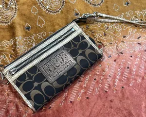 Coach Black and Gold Wristlet thumbnail 1