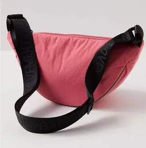 FP Movement Bulls Eye Sling Bag Coral Reflective Crossbody Belt Bag NWT thumbnail 1