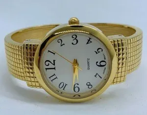 Ladies Quartz analog 30mm gold tone cuff bracelet watch white dial size 7” runs thumbnail 1