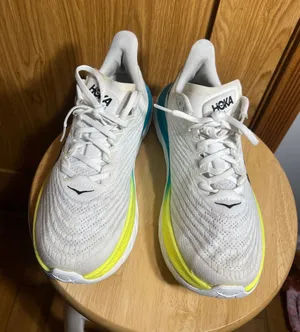 Hoka White Athletic Shoes with Yellow and Teal Accents thumbnail 1