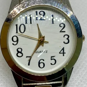 Women’s quartz analog watch gold silver tone 28mm stretch band 6.5” running thumbnail 3