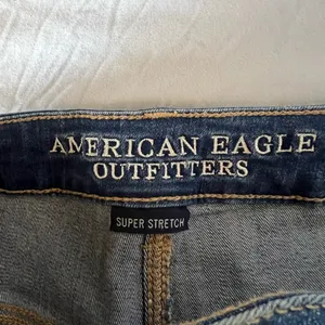 American Eagle distressed jean shorts. thumbnail 4