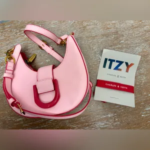 CHARLES & KEITH’s Limited-edition collaboration ITZY Gabine hobo saddle bag. thumbnail 3