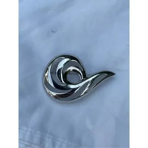 Vintage shiny Monet swirl brooch. Large thumbnail 4