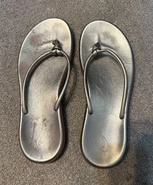 Olukai Gold Metallic Thong Huawai Sandals thumbnail 1