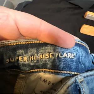 American Eagle Women's Sz 00 Regular Super Hi-Rise Flare Jean Distressed Raw Hem thumbnail 10