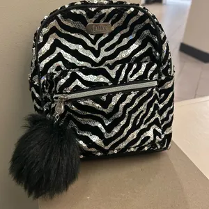 Justice Black and Silver Sequin Zebra Backpack Like New! thumbnail 1