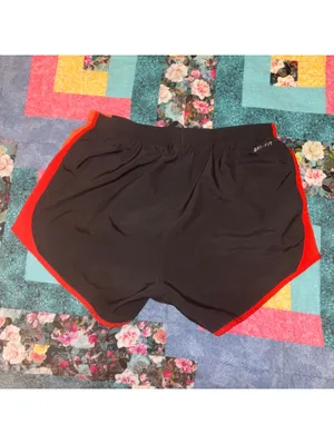 Nike Dri-FIT Running Athletic Shorts Woman’s Size Small Black and Red With Liner thumbnail 4