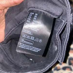 black denim skinny ankle jeans thumbnail 6