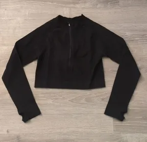 HIIT By Asos seamless rib 1/4 zip Crop top in black Size Large thumbnail 1
