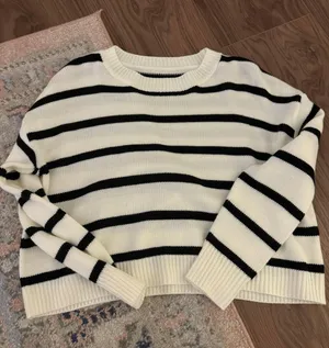 White and black sweater thumbnail 1
