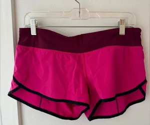 • Lululemon Athletica • Women’s Speed Up Shorts pink black Size 8 thumbnail 1