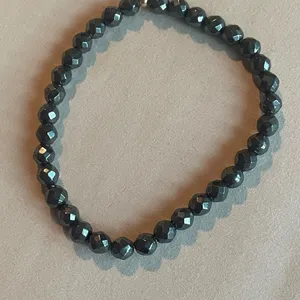 Black Beaded Bracelet with gold bead thumbnail 2