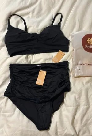Black high waisted bottoms and black cut out bikini top thumbnail 1