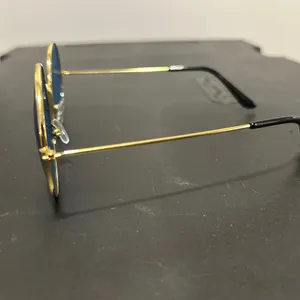 Round Gold Frame Sunglasses with Blue Lenses thumbnail 4