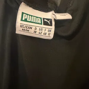 Puma Women's Black with white side stripe w/puma logo Crisscross Backless Dress thumbnail 5