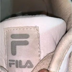 Fila sneakers size 7.5 women’s in white thumbnail 6