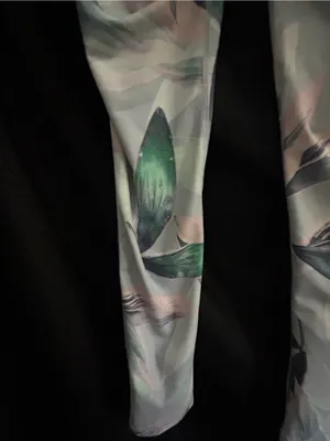 Fabletics Athletic Pastel Leaf Print Leggings in Light Blue, Green & Pink MD thumbnail 8