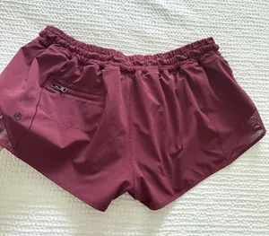  Lululemon maroon lined drawstring shorts with reflective striped sides   thumbnail 5